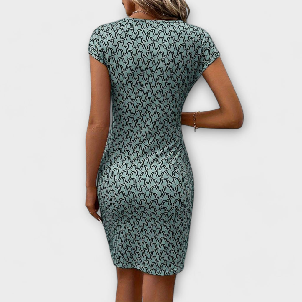 Emma™ | Vestido de manga corta con corte tulipa y estampado en todo el lado