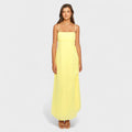 Flossie™ | Vestido maxi amarillo con lazo lateral