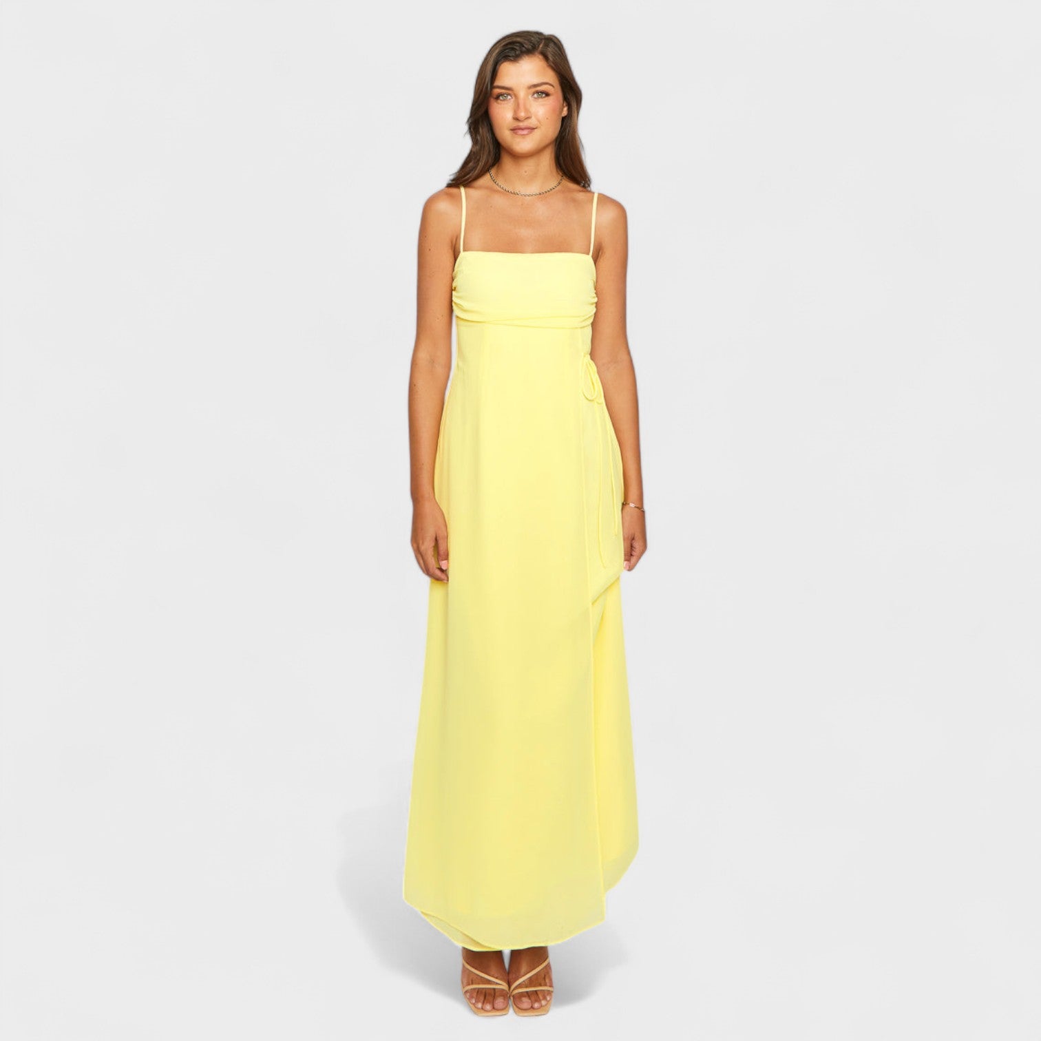 Flossie™ | Vestido maxi amarillo con lazo lateral