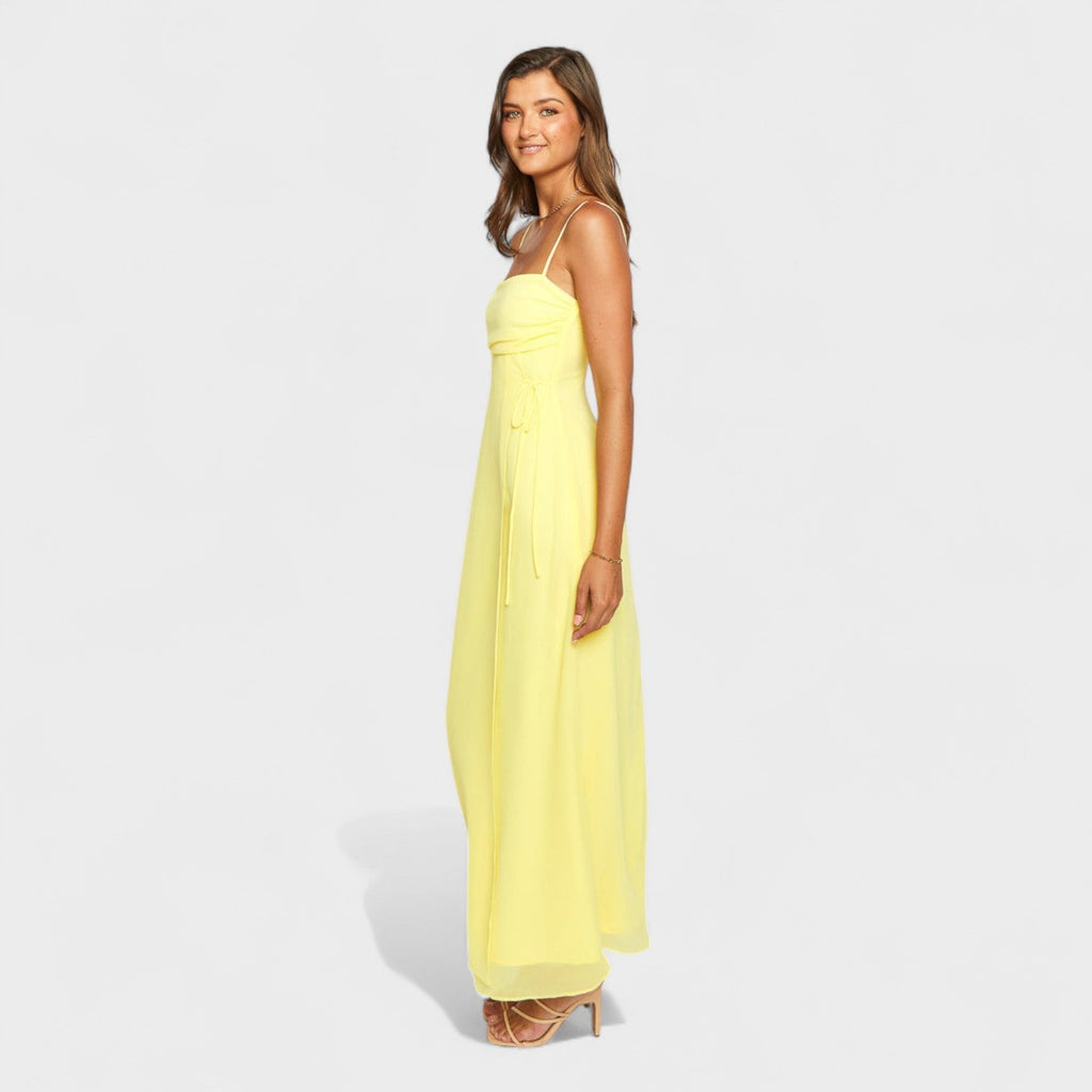 Flossie™ | Vestido maxi amarillo con lazo lateral