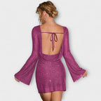 Vestido de lentejuelas con espalda descubierta y mangas largas